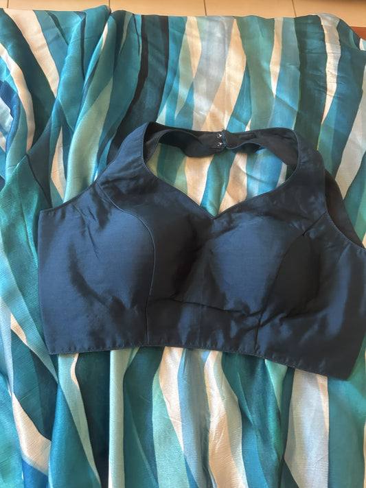 Black sports bra on a striped fabric background