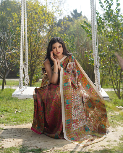 Woman in a traditional outfit sitting on a swing with a scenic background