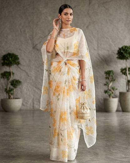Woman in a floral outfit standing in a room with plants